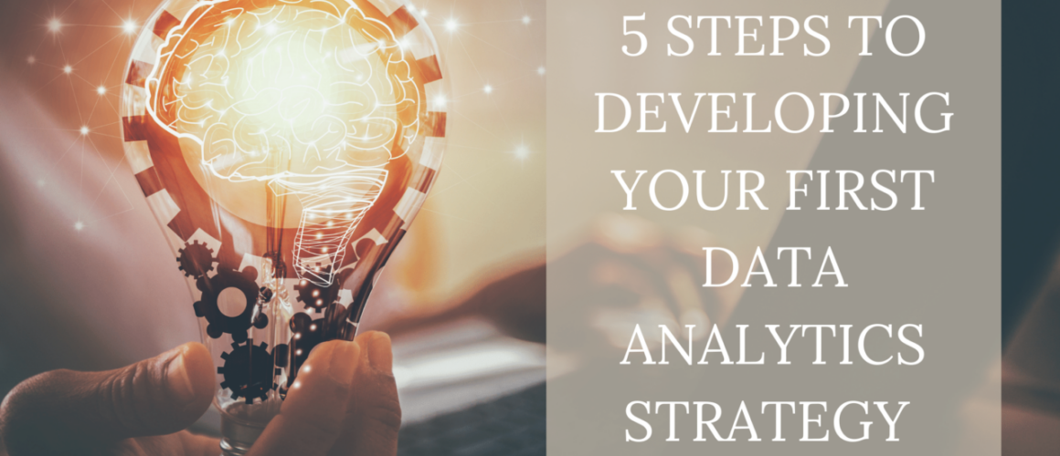 Man holding a light bulb with the words 5 steps to developing your first data analytics strategy on it
